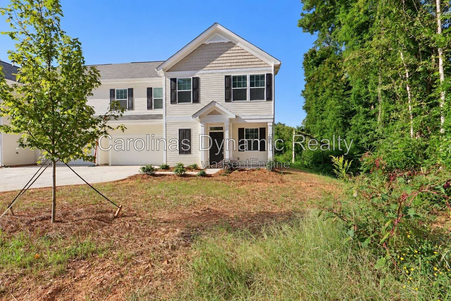 Bright End-Unit Townhome with Two-Car Garage & Convenient Access to I-485 property image