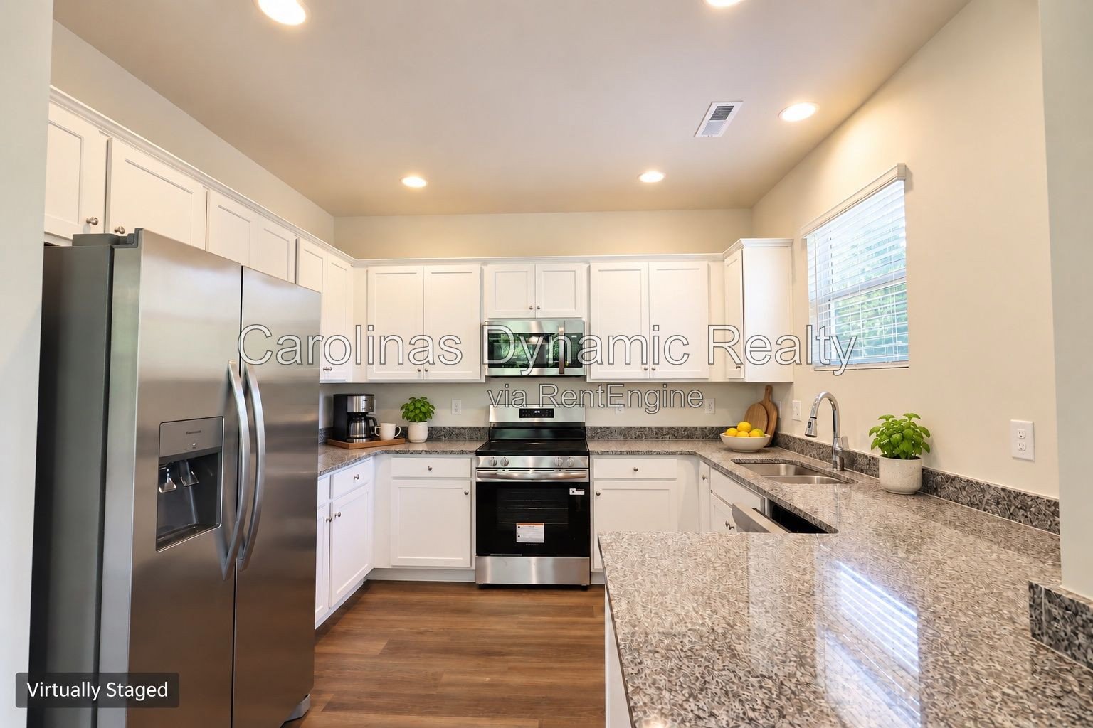 Bright End-Unit Townhome with Two-Car Garage & Convenient Access to I-485 property image