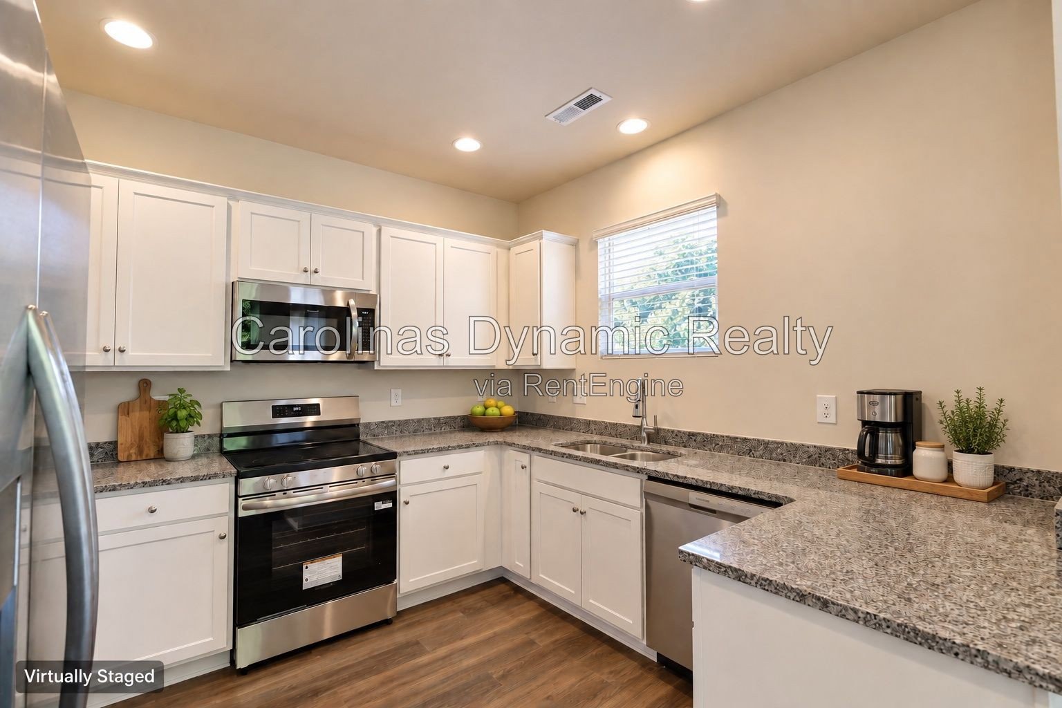 Bright End-Unit Townhome with Two-Car Garage & Convenient Access to I-485 property image